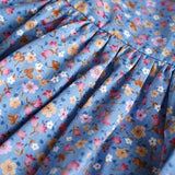 FLORA IN LILY BELL